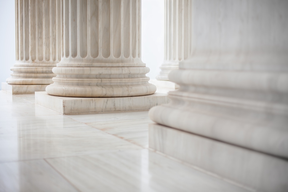 Piastrone marble, granite floors in radial patterns, Burmese teak — every element to the 500-year directive.