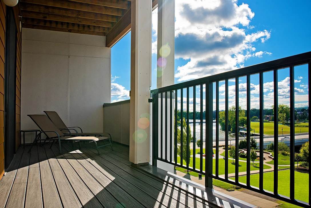 On grade below the podium — parking, retail, offices, fitness and community space.